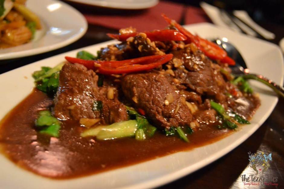 the royal budha wok fried beef with thai brocolli